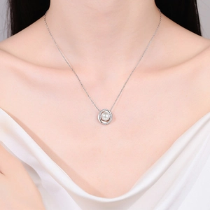 Elegant S925 silver necklace with a round pearl and moissanite pendant on a model