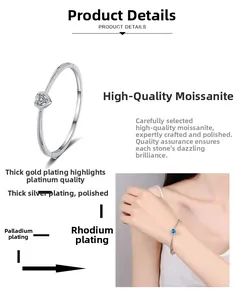 Detail of S925 silver heart bracelet with blue moissanite and multi-layer plating