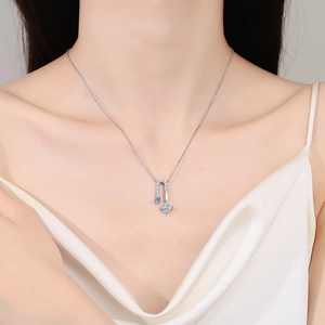 S925 sterling silver necklace with geometric square moissanite pendant on female model