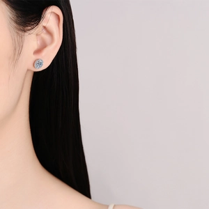 Elegant S925 sterling silver oval halo moissanite stud earrings on a female model
