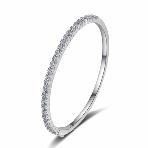 Polished 925 sterling silver bangle featuring a full row of sparkling moissanite stones