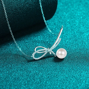 S925 silver bow pendant necklace with moissanite accents and white pearl drop