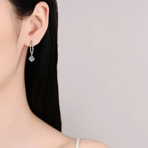 S925 sterling silver paperclip tassel earrings with moissanite stones on female model