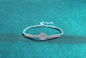 Macro detail of S925 sterling silver moissanite bracelet with lobster clasp and chain