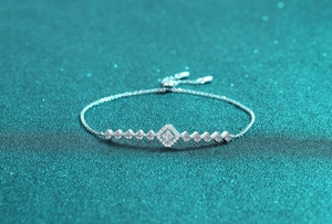 Macro detail of S925 silver moissanite bracelet with adjustable Bolero clasp and slider