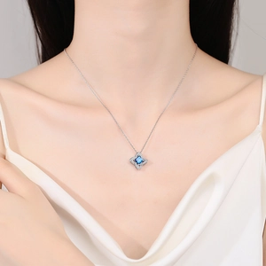 Elegant S925 sterling silver necklace with square sapphire blue moissanite pendant on model