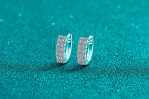 Detailed close-up of S925 silver hoop earrings with double row moissanite stones