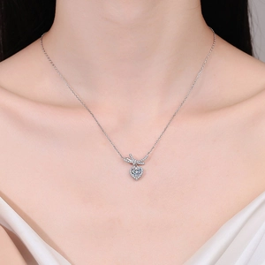 Elegant S925 silver moissanite heart necklace with sparkling bow pendant for women