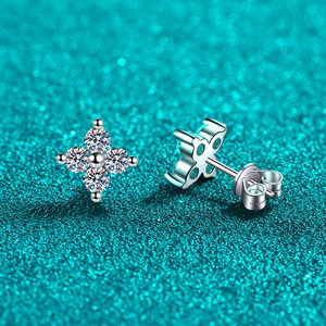 Sparkling S925 sterling silver four-petal flower stud earrings with moissanite crystals