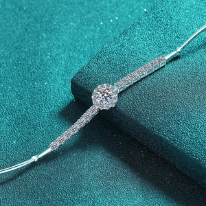 Elegant S925 sterling silver moissanite bracelet featuring a brilliant round center stone