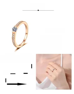 Detail of champagne gold moissanite ring showing multilayer plating process and on-hand look