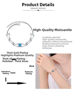 Detailed macro view of S925 silver double chain bracelet with square blue moissanite