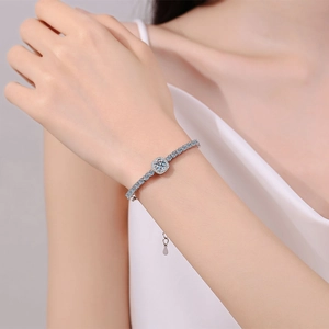 S925 sterling silver moissanite bracelet with square halo on model's wrist