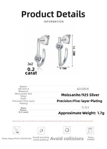Macro detail of J-shape moissanite stud earrings showing 925 silver specs and 16.2mm size