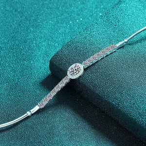 S925 sterling silver bracelet featuring an oval blue moissanite in a green gift box