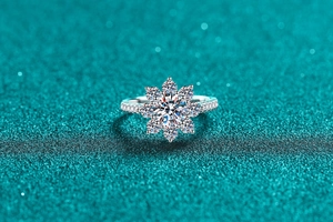 Close-up of S925 sterling silver sunflower ring with brilliant round moissanite