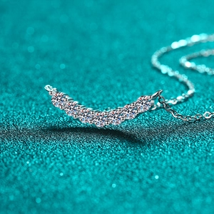 Elegant 925 sterling silver smile necklace featuring seven round moissanite stones