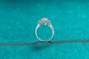 Detailed side view of S925 silver sunflower moissanite ring with halo setting