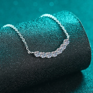 Elegant 925 sterling silver smile necklace featuring seven sparkling round moissanite stones
