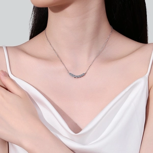 Elegant S925 sterling silver moissanite smile necklace worn on the collarbone