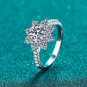 Elegant S925 sterling silver sunflower ring with 1-carat moissanite on blue background