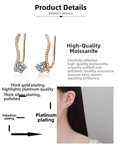 Gros plan de boucles d'oreilles moissanite en cœur montrant le placage à l'or multicouche