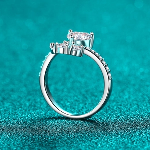 Elegant 925 sterling silver ring with three round moissanite stones and pavé accents