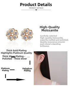 Detail view of five-petal flower moissanite studs in champagne gold on a female model