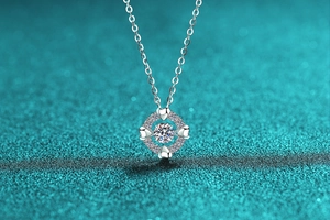 Macro detail of S925 sterling silver heart necklace with moissanite center stone