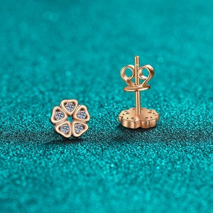 Rose gold heart-shaped petal flower stud earrings with sparkling moissanite accents
