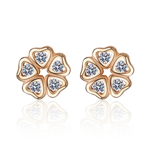 Elegant rose gold heart petal earrings with sparkling moissanite stones on white background