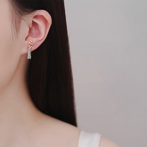 S925 silver champagne gold butterfly earrings with vertical moissanite stones on model