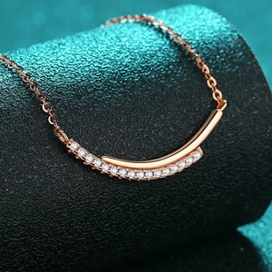 Elegant 925 sterling silver smile necklace in champagne gold with sparkling pavé moissanite