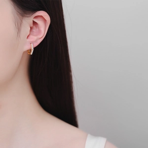 Minimalist gold S925 sterling silver hexagonal hoop earrings with diamonds on model