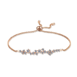Bracelet ajustable en or rose avec étoiles et moissanites et fermoir coulissant
