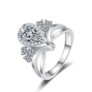 Elegant 925 sterling silver ring with pear cut moissanite and floral halo accents