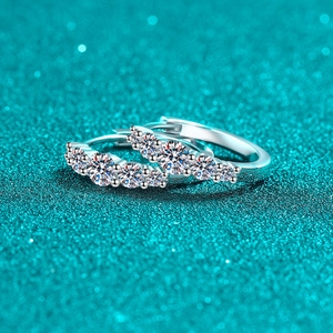 S925 sterling silver huggie earrings with five graduated round moissanite stones