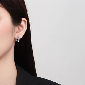 Elegant S925 sterling silver hoop earrings with four sparkling blue round-cut moissanite stones