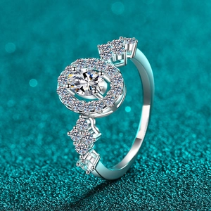 Elegant 925 silver ring featuring a blue oval moissanite stone and halo diamond design