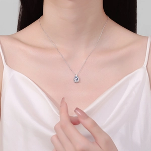 Elegant S925 sterling silver necklace with square moissanite pendant on female model