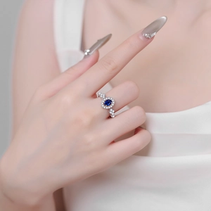 S925 sterling silver ring with royal blue oval moissanite and halo diamond setting