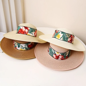 Fashionable wide brim straw sun hats for women with tropical floral ribbon in four colors