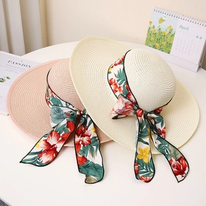 Fashionable wide brim straw sun hats with floral ribbon bow for summer beach vacation