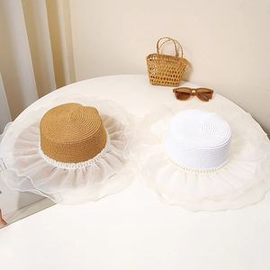 Flat top straw sun hat with large brim, white lace organza edging and pearl band