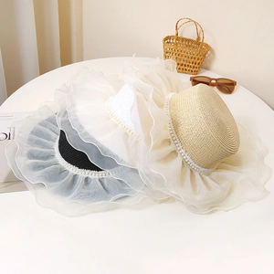 Flat top straw sun hat with pearl trim and lace brim in black, white, and beige colors