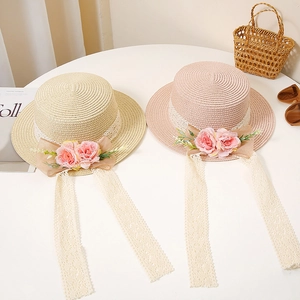 Flat top straw sun hats with floral lace ribbons for summer beach vacations