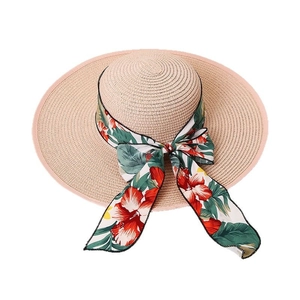 Fashionable beige straw hat with floral ribbon bow for women outdoor sun protection
