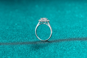 Macro shot of S925 sterling silver sunflower ring with moissanite halo and side diamonds