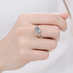Elegant S925 sterling silver moissanite ring with leaf design worn on a finger