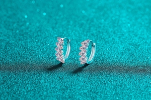 Detailed view of S925 silver hoop earrings featuring baguette-cut moissanite stones